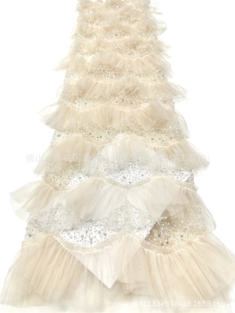 Falda de pastel laminada hecha a mano hilo de malla de perlas ligero lujoso vestido de aire de hadas de estilo de moda alta tela de vestido