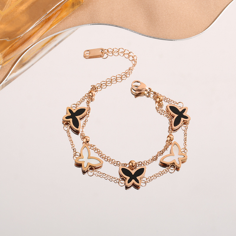 Estilo coreano blanco y negro Concha mariposa pulsera de oro rosa geométrica de doble capa pulsera de acero de titanio fábrica de joyas para niñas