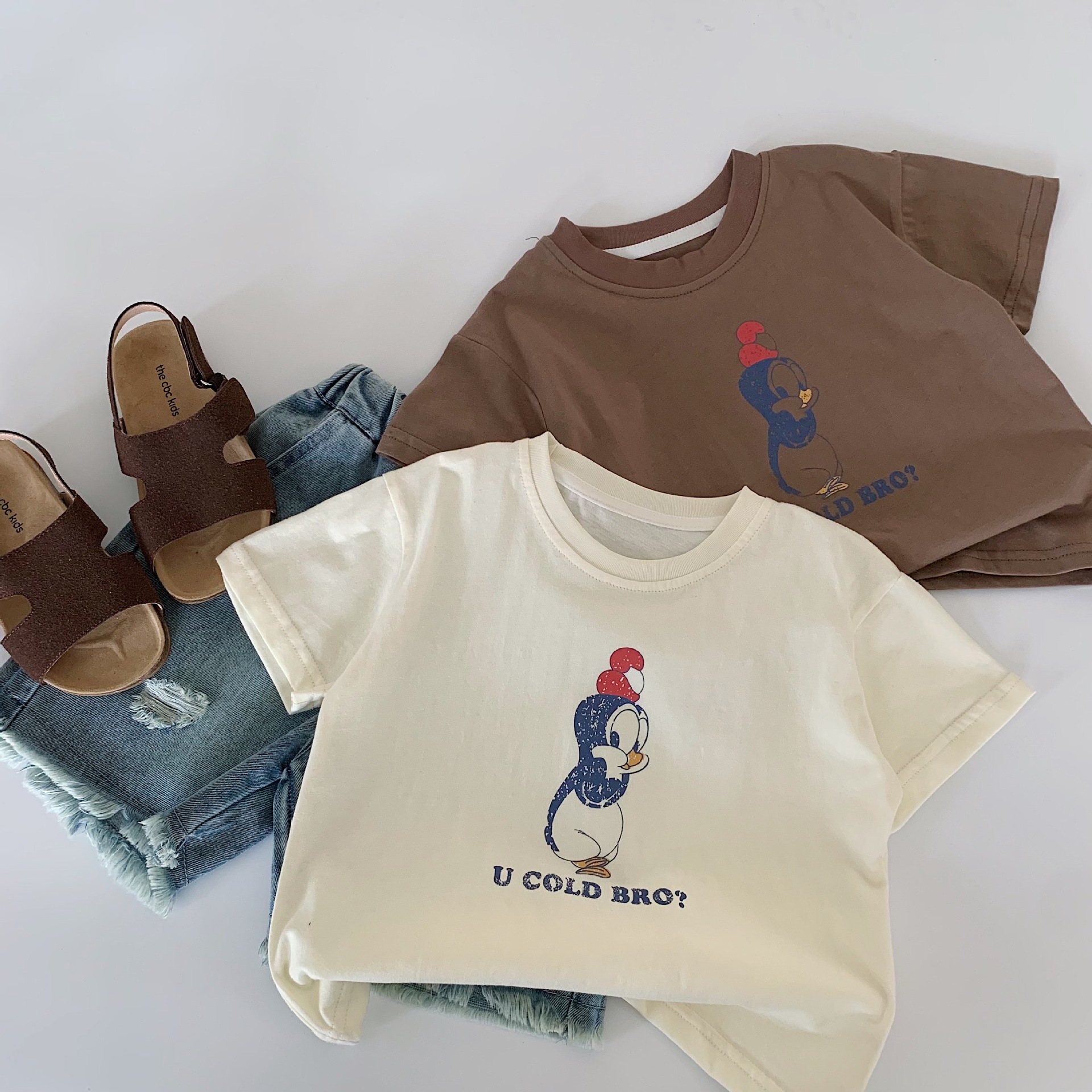 Camiseta de manga corta para niños Maibao 2025 verano nuevo estilo coreano niños y niñas tops de dibujos animados a ropa para niños al por mayor