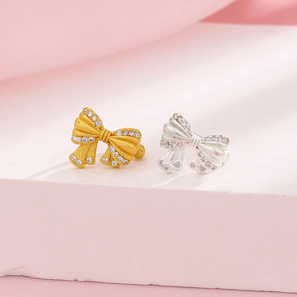 Matte small design earrings with bow