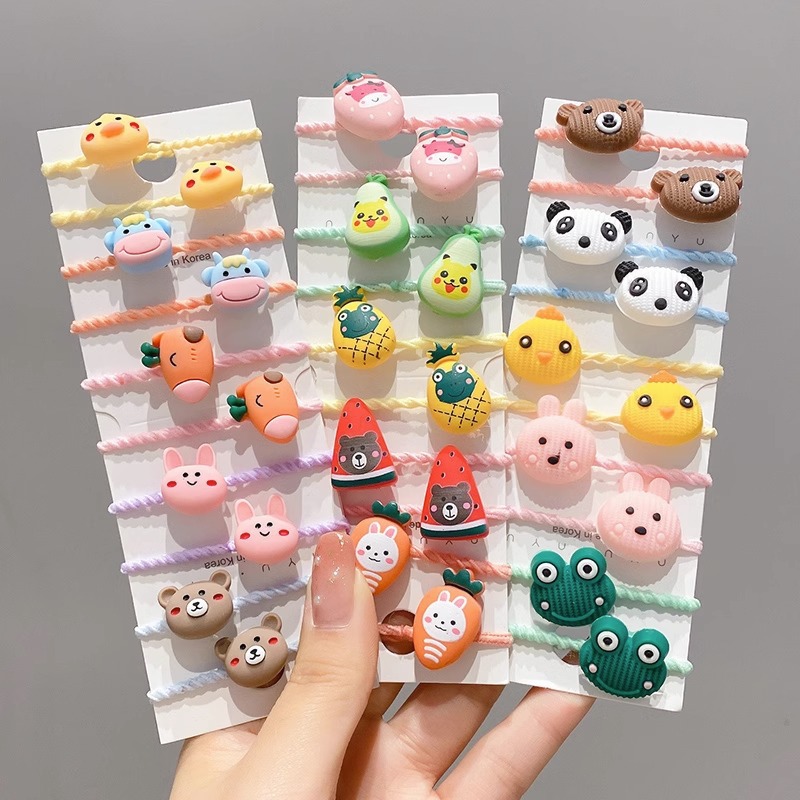 La cuerda del pelo del bebé de las muchachas de la banda de goma de los niños no lastima el pelo Los accesorios del pelo del pulgar del tamaño pequeño atan la banda de goma del pelo