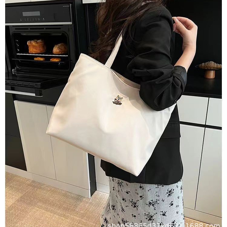 Capacious one-shoulder bag