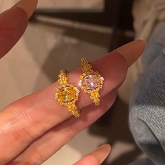 Xiaohongshuの人気の華やかな花、高炭素ダイヤモンド、鳩の卵の黄色いダイヤモンドリング、高級ピンクダイヤモンドリング、レディースリング