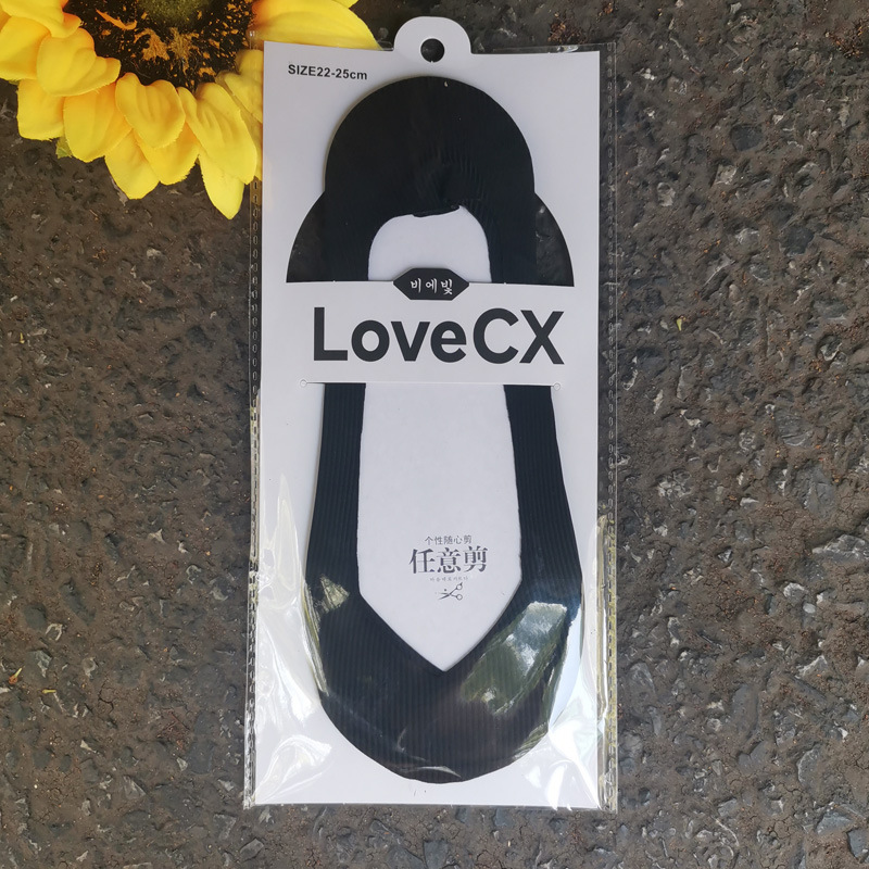 Verano de las mujeres nuevo corte arbitrario de hielo de seda de silicona antideslizante calcetines invisibles de color sólido sin costuras de las mujeres calcetines de barco de corte bajo al por mayor