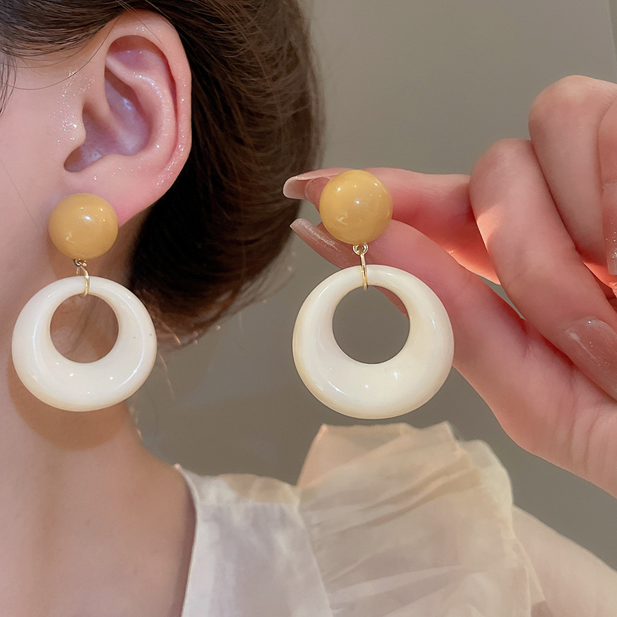 Pendientes de flores de color dopamina de verano Pendientes de todo fósforo de nicho fresco Pendientes de lujo de alta gama de moda al por mayor