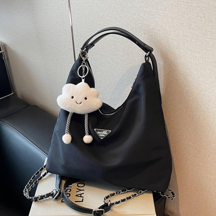 Transfronterizo superfire nylon gran capacidad tote bag2025 nuevo ocio versátil mochila simple mochila mujer