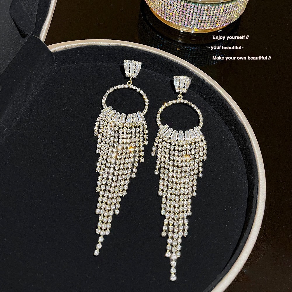 S925 aguja de plata elegante borla pendientes de alta gama simple cara de adelgazamiento pendientes de todo fósforo estilo coreano nuevos pendientes de moda al por mayor