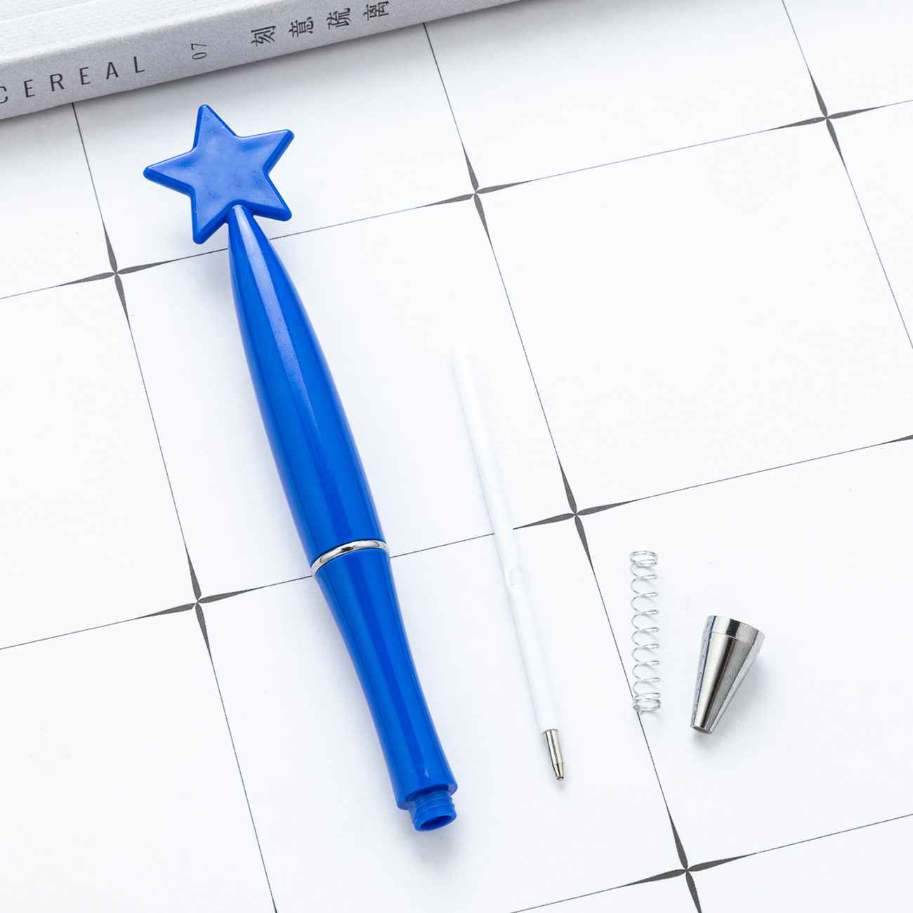 Estrella de dibujos animados pluma de plástico estudiante escritura papelería giratoria giro pluma imprimible logotipo regalo publicidad bolígrafo