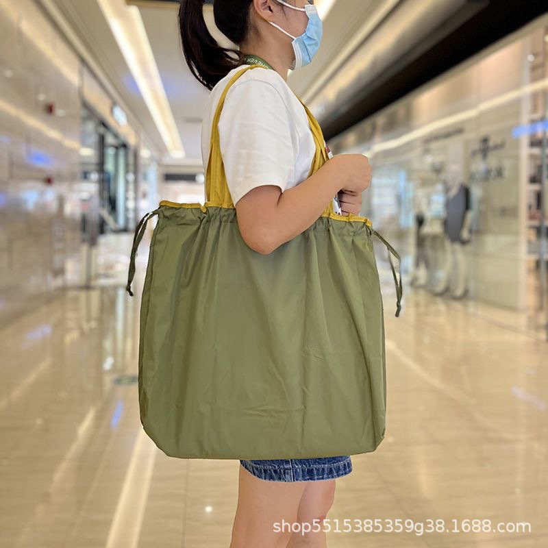 Big solid color handheld folding one-shoulder bag