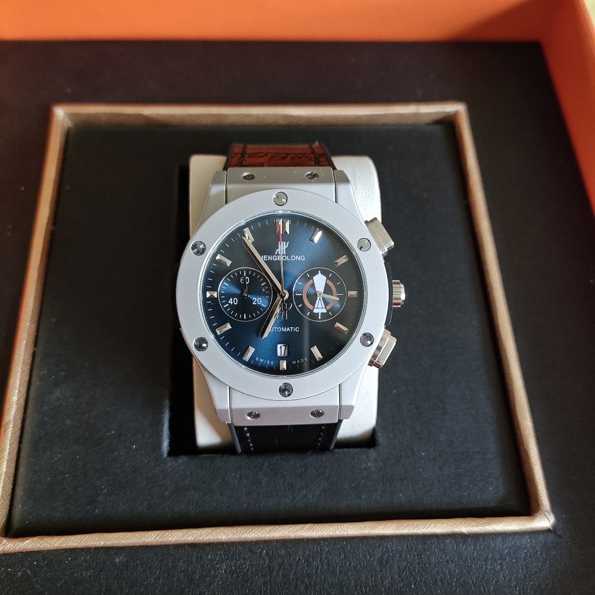 恒家は時間を計って秒の多機能の石英の男性の時計を走らせます。