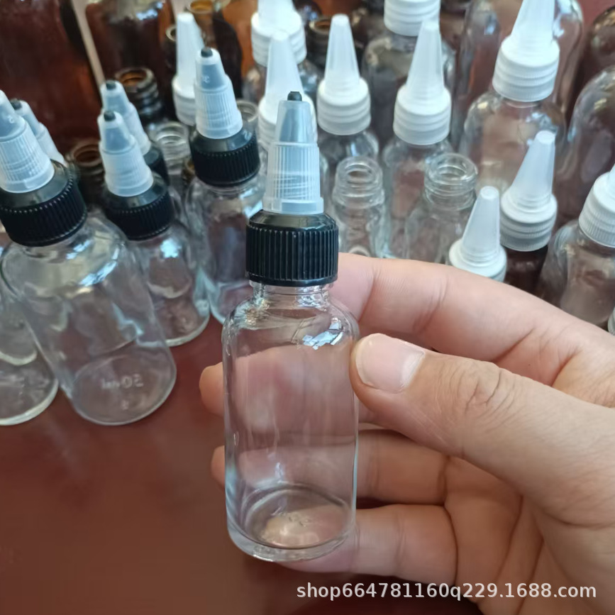 Botella de punta de vidrio Botella de aceite esencial Botella de esencia Botella de agua Botella de solución bruta Botella vacía Botella de goteo de punta rotativa Botella sellada