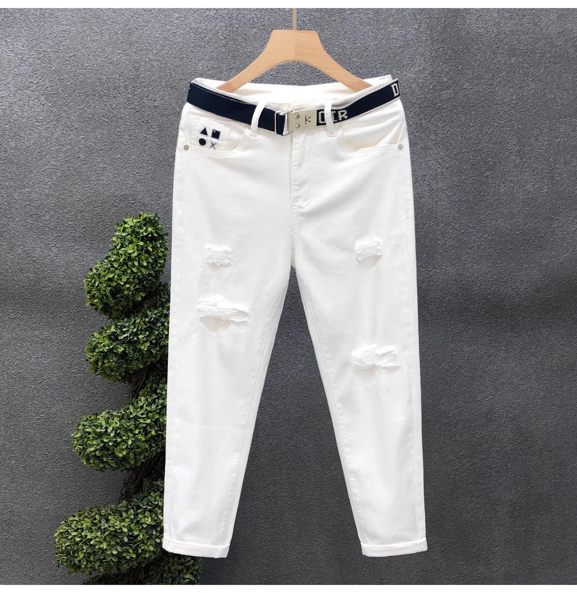 Jeans slim fit uomo denim strappato alla moda per l'estate_voghion.com