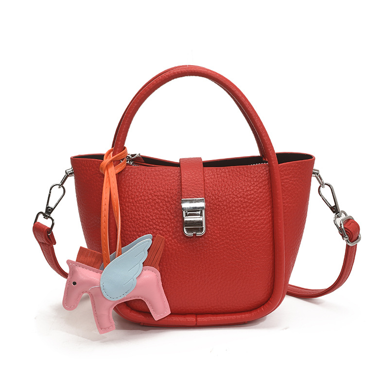 Bolso de cubo para mujer, tendencia transfronteriza de alta gama, bolso de mano con patrón de lichi, viaje diario, bolsa de mensajero de canasta de verduras de estilo occidental
