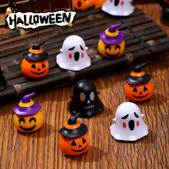 ハロウィンの幽霊の子供のカボチャの回力車の祝日のパーティーの雰囲気は小さい置物の幼稚園の回力車を飾ります。