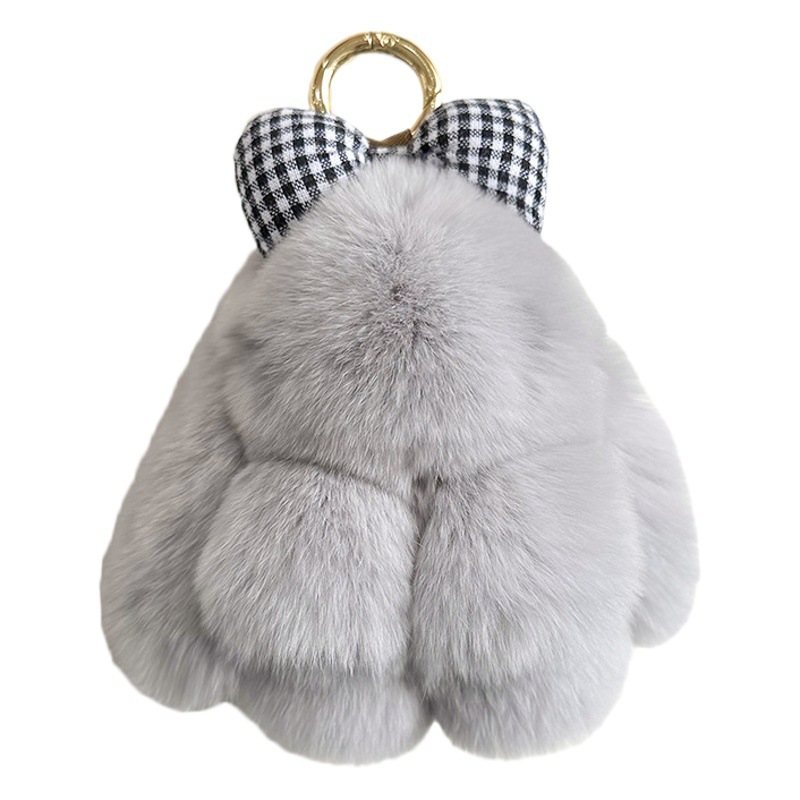 卸売りのかわいいウサギの毛の蝶結びの小さいウサギの自動車のキーホルダーはぬいぐるみのかばんを掛けて飾ります。