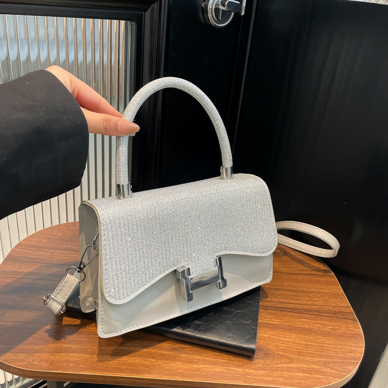 Modesta pequeña atmósfera fresca y simple bolso cuadrado de verano 2025, nueva dama sensación de estilo extranjero dulce mochila de hombro