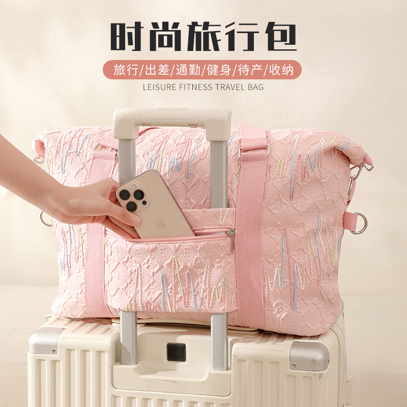 Capacious handheld organizer bag