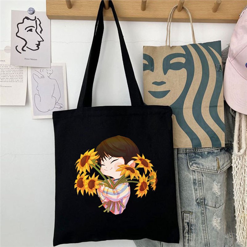 明星周边卡通公仔帆布袋 手捧向日葵印花时尚单肩包 可爱学生书袋