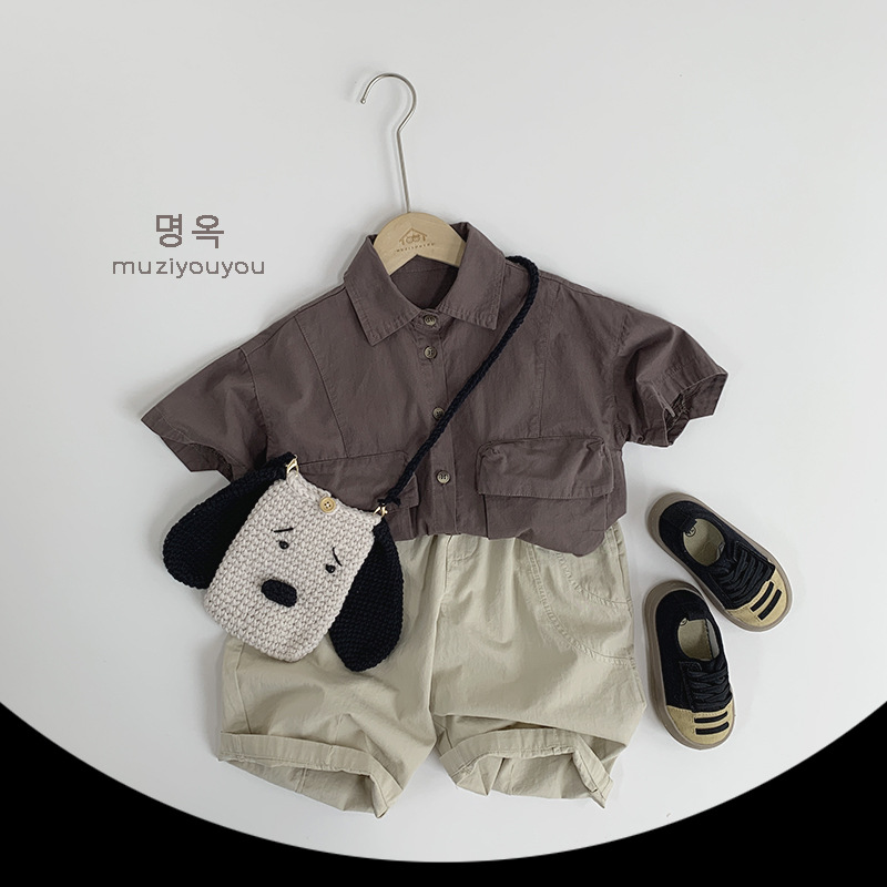 Ropa para niños Camisas de color sólido para niños y niñas 2025 primavera y verano nuevos niños japoneses y coreanos de manga corta de algodón fino ropa de trabajo superior