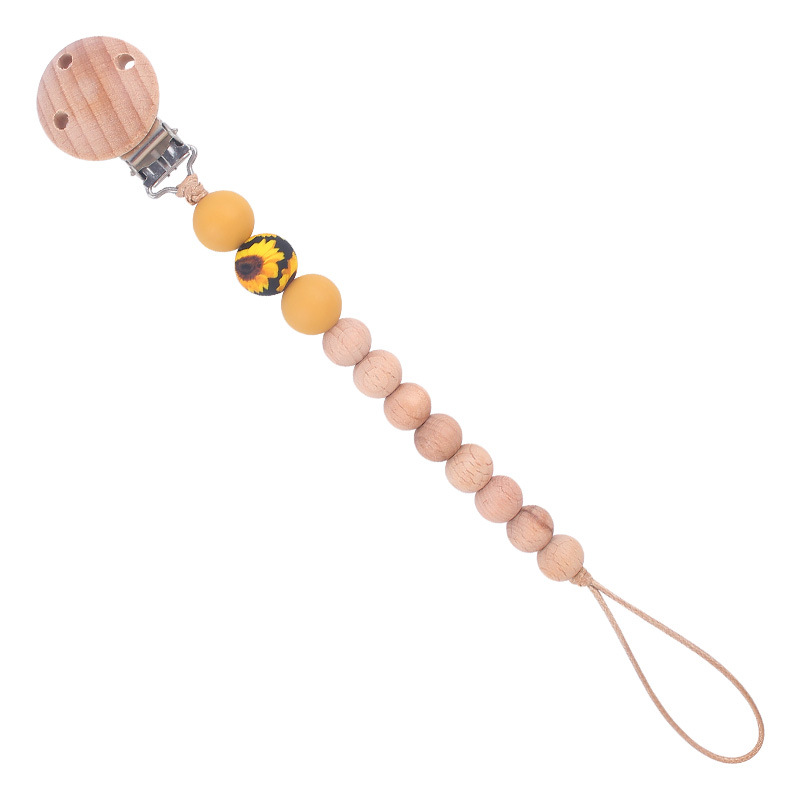 Nuevos suministros para bebés Beech chupete clip calmante bebé macaron cuentas impresas mordedura chupete cadena anti-caída de la cadena