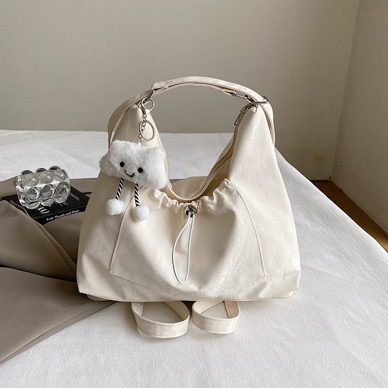 Bolsos de alta sensación de mujer 2024 nueva mochila de hombro, mochila de hombro de gran capacidad, mochila multicapacidad