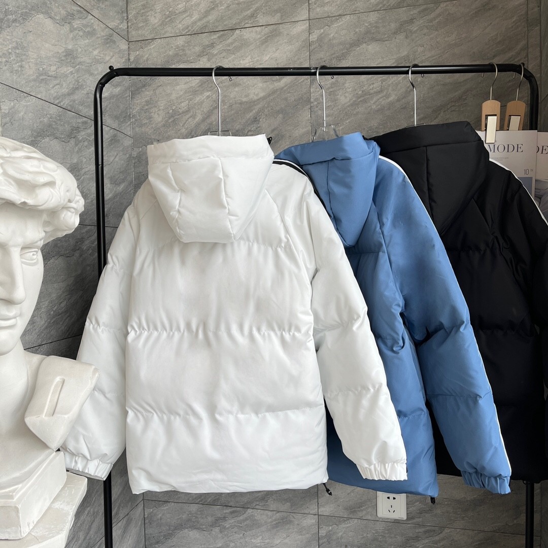 Tres barras transfronterizas chaqueta de algodón de plumón para hombres y mujeres parejas de invierno con chaqueta de algodón húmedo suelta y gruesa se puede abrir