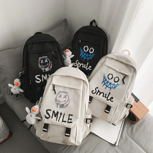跨境热卖学生双肩包韩版可爱笑脸情侣背包初高中校园书包印logo