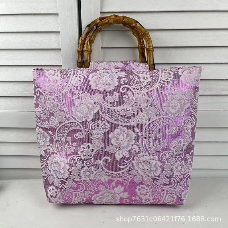 新中式国风包包女2025新款贡缎提花休闲度假风复古竹节手提旗袍包