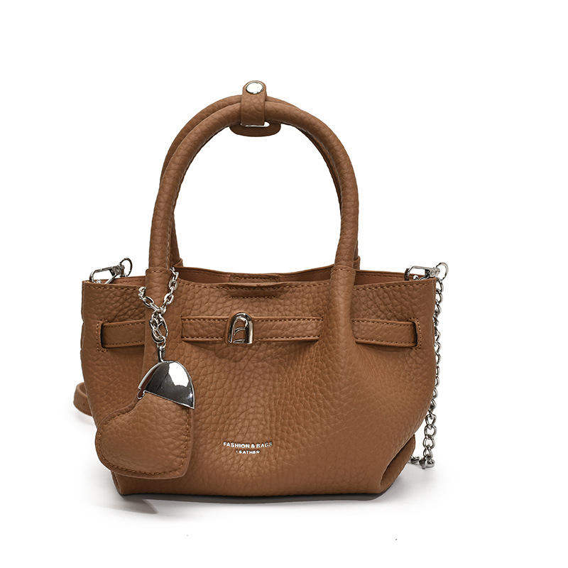 Tendencia versátil bolso de mano para mujeres 2025 nuevo estilo simple textura de transporte de tren mochila de alta calidad bolso de brazo de moda