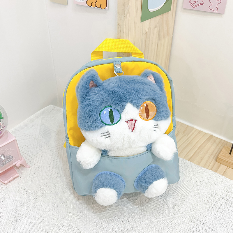 Nueva mochila de dibujos animados para niños tendencia pupila diferente gato muñeca mochila desmontable jardín de infantes en stock
