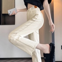 米の白いタバコのパイプのジーパンの女性の2025年の春と秋のベルベットの高い腰の小さい9分はやせている白いストレートのズボンを現します。
