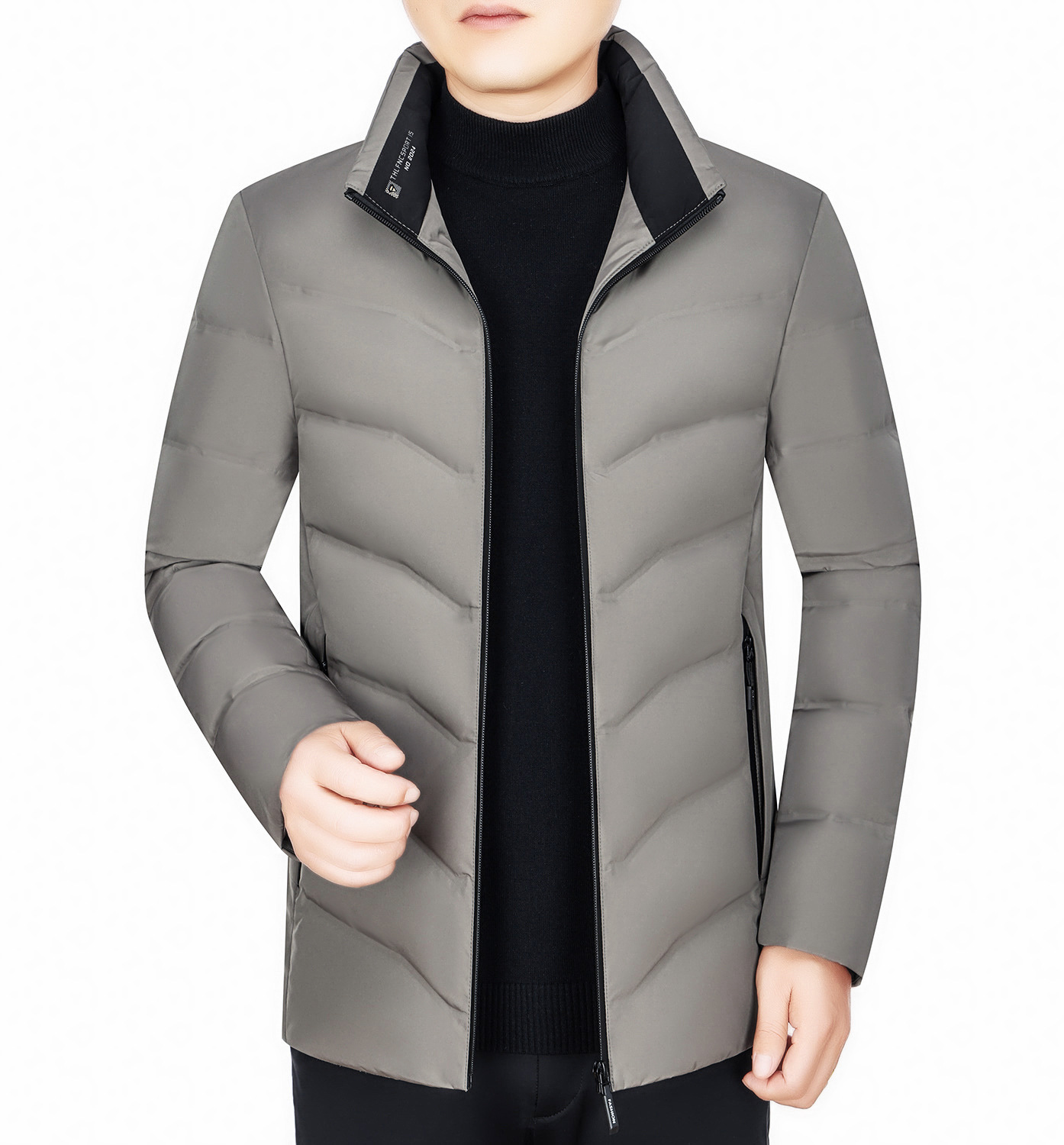 冬の新型ダウンジャケット男性のショートタイプの軽薄で厚手の防寒コートの中で青年男性のカジュアルなアヒルの綿毛の服は代行します。