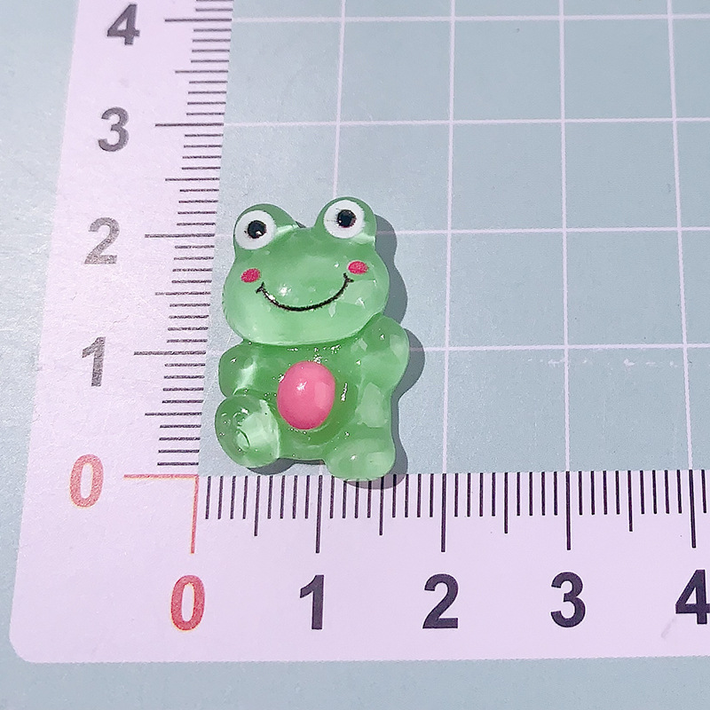 Accesorios de resina de rana de explosión DiDi dibujos animados transparentes animales abrazadera de cabello agujero de cuerda agujero de botón de zapato material de parche de caso de teléfono móvil