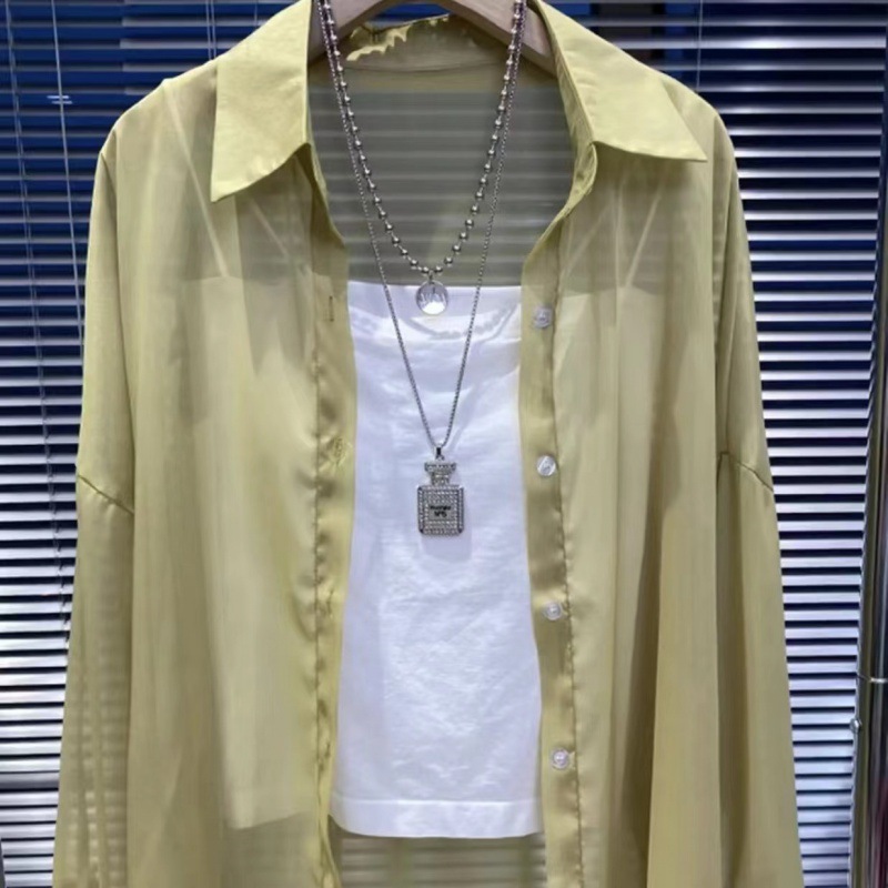 Hilo de perlas de diseño delgado micro-transparente de manga larga abrigo protección solar camisa Alibaba red al por mayor 1688