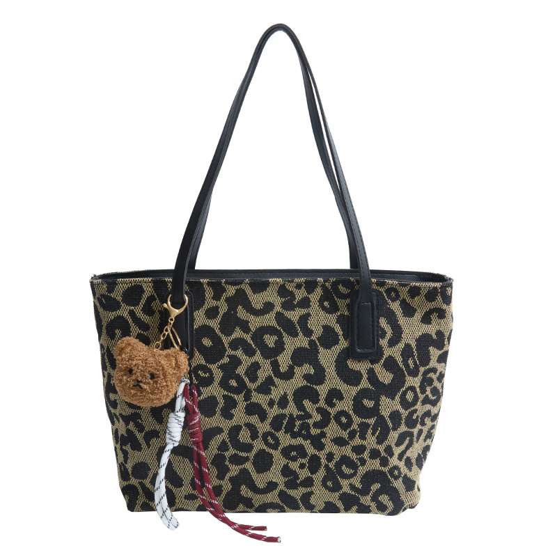 Este año popular bolsa de invierno de gran capacidad para mujeres 2024 nuevo nicho de leopardo bolso de hombro portátil