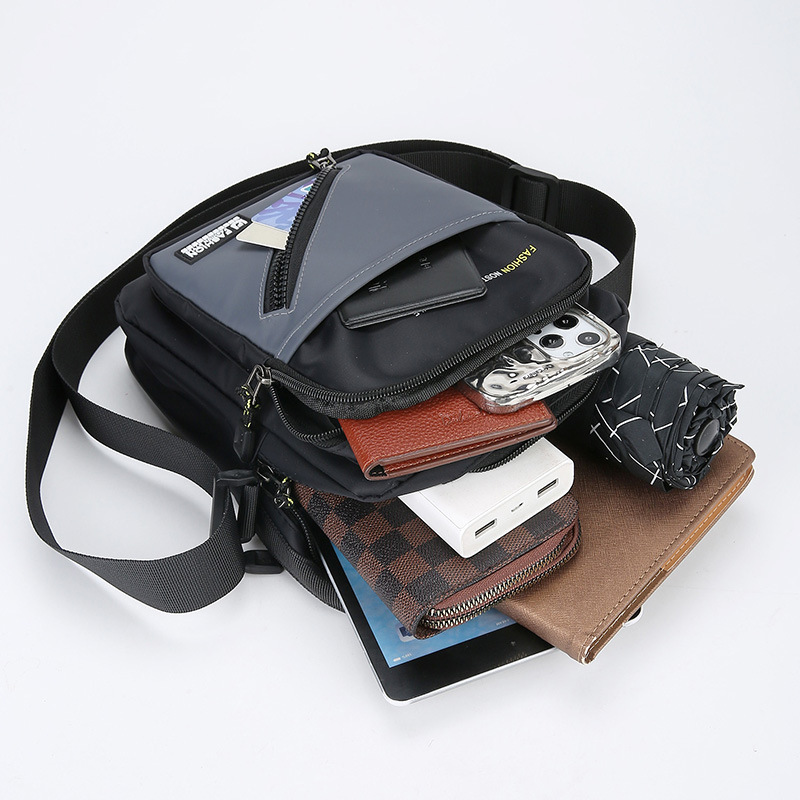 Bolso de hombro para hombre de nuevo estilo bolso de tela Oxford ligero bolso de viaje deportivo de ocio simple y versátil bolso de mensajero de moda marea