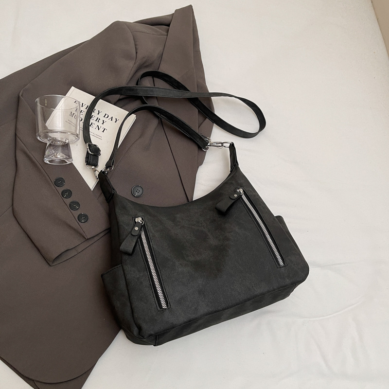 Bolsa de gran capacidad para mujeres 2024 otoño y invierno nuevo mochila mochila de textura esmerizada nicho bolso de hombro para viajar bolso de mujer