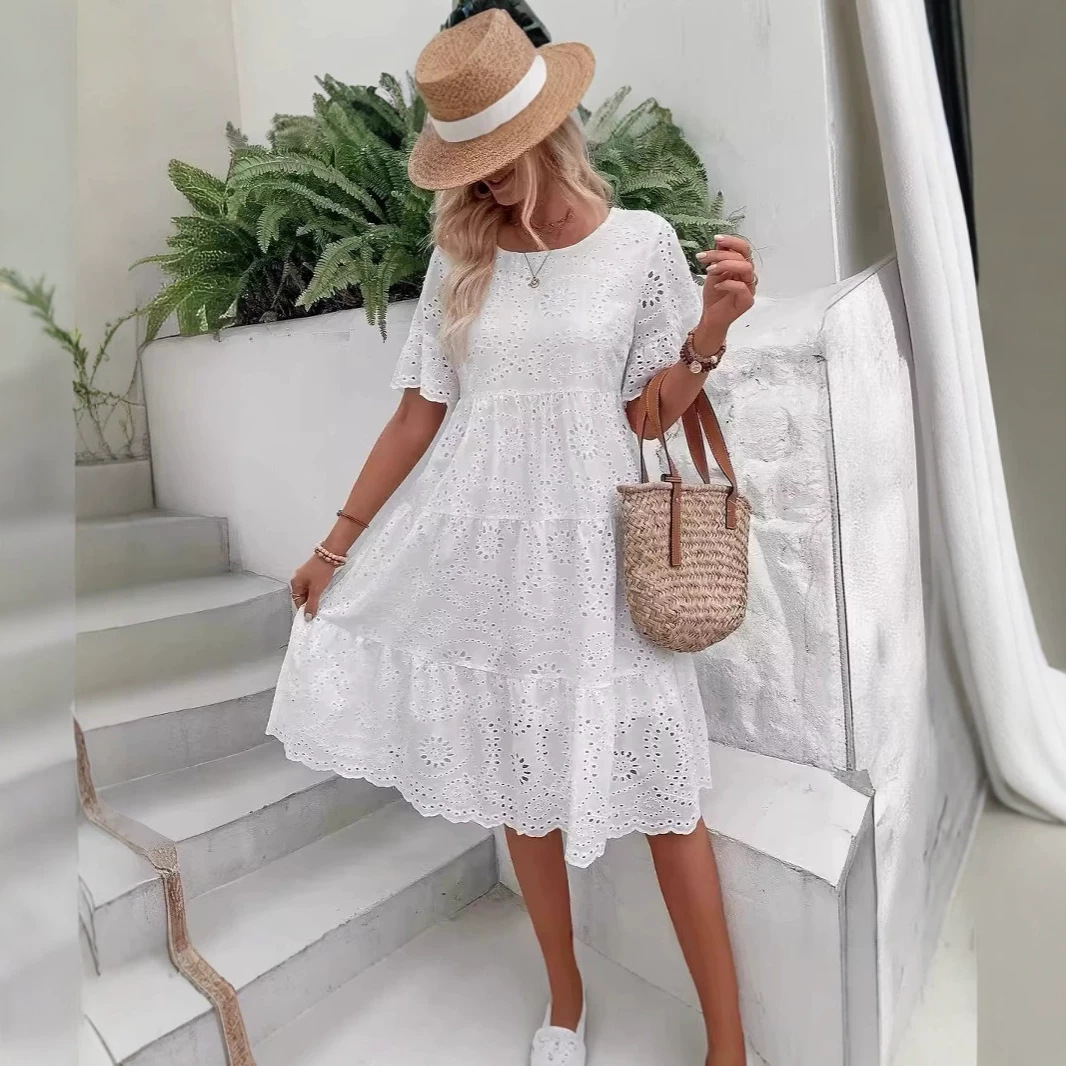 white beach dress with a round collar