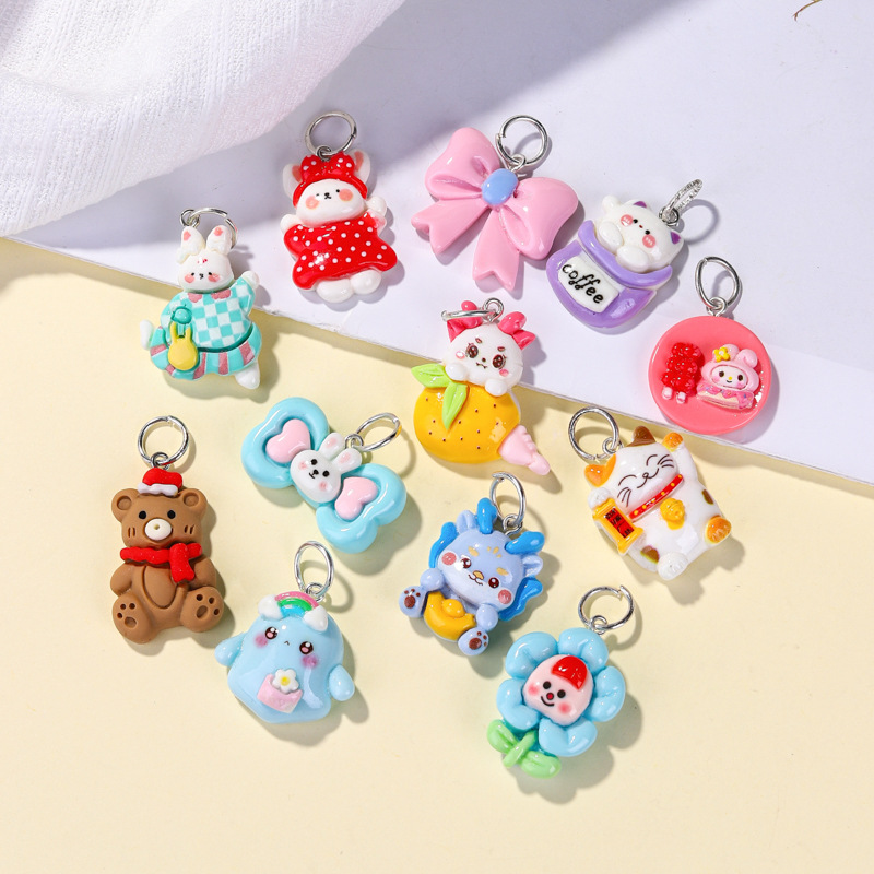 Llavero de material de resina de dibujos animados al por mayor, accesorios lindos, colocación creativa, colgante de bolsa portátil