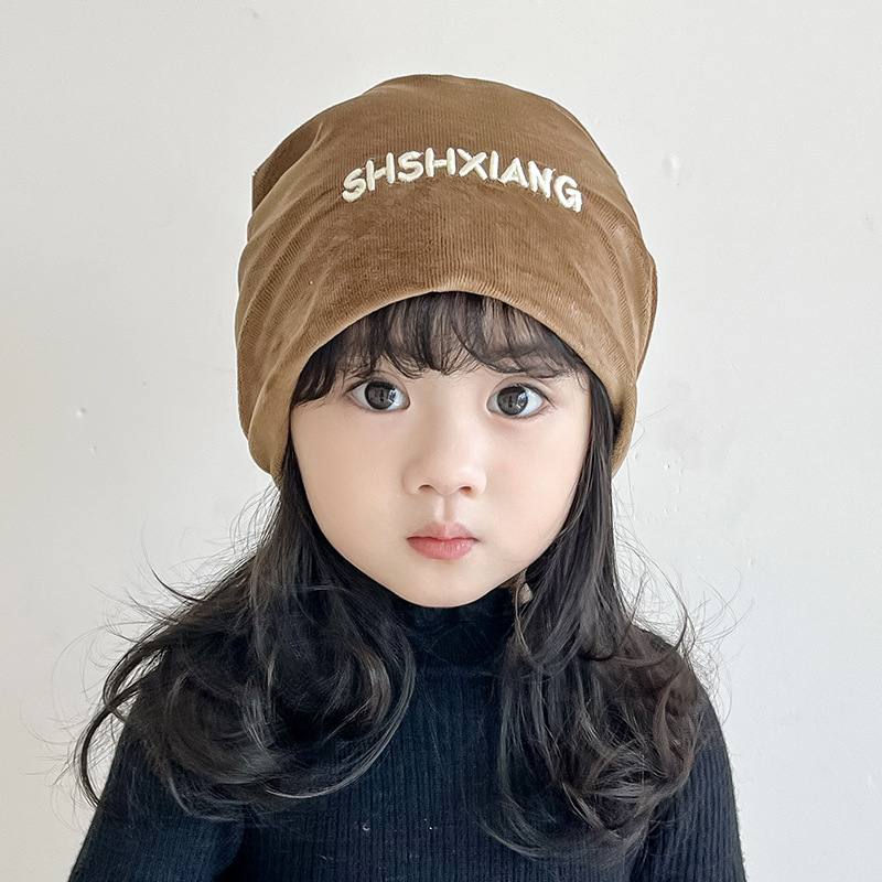 Hombres y niñas sombreros de moda de otoño de algodón húmedo para niños estilo extranjero sombreros de pila de estilo jardín de infantes negros a prueba de viento orejas