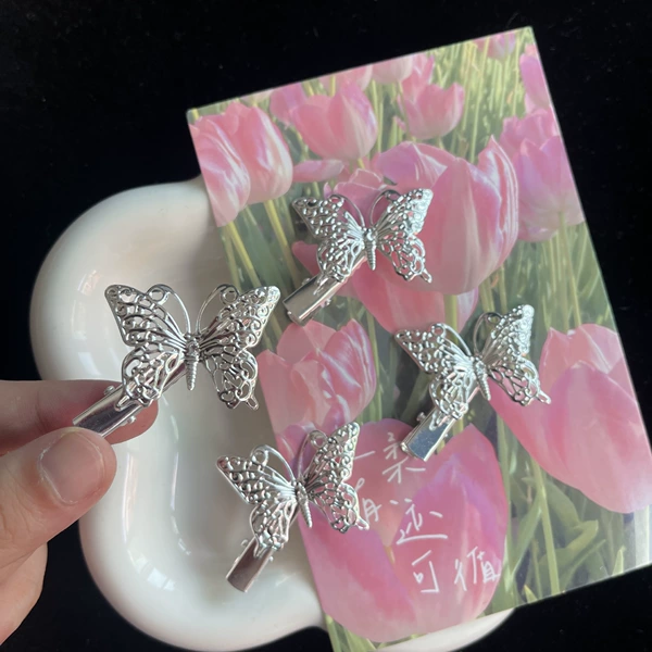 Hollow silver butterfly hair clip