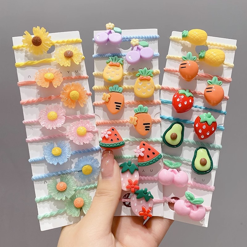 La cuerda del pelo del bebé de las muchachas de la banda de goma de los niños no lastima el pelo Los accesorios del pelo del pulgar del tamaño pequeño atan la banda de goma del pelo