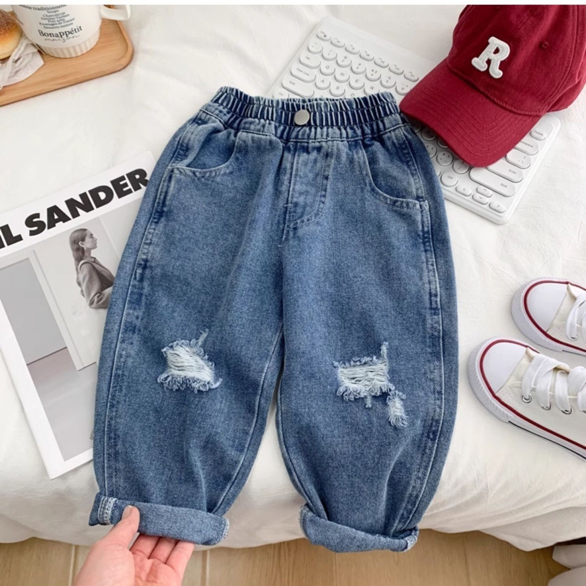 Ropa de primavera para niños, jeans agujeros para niños, pantalones de estilo suelto para niños, pantalones de estilo coreano