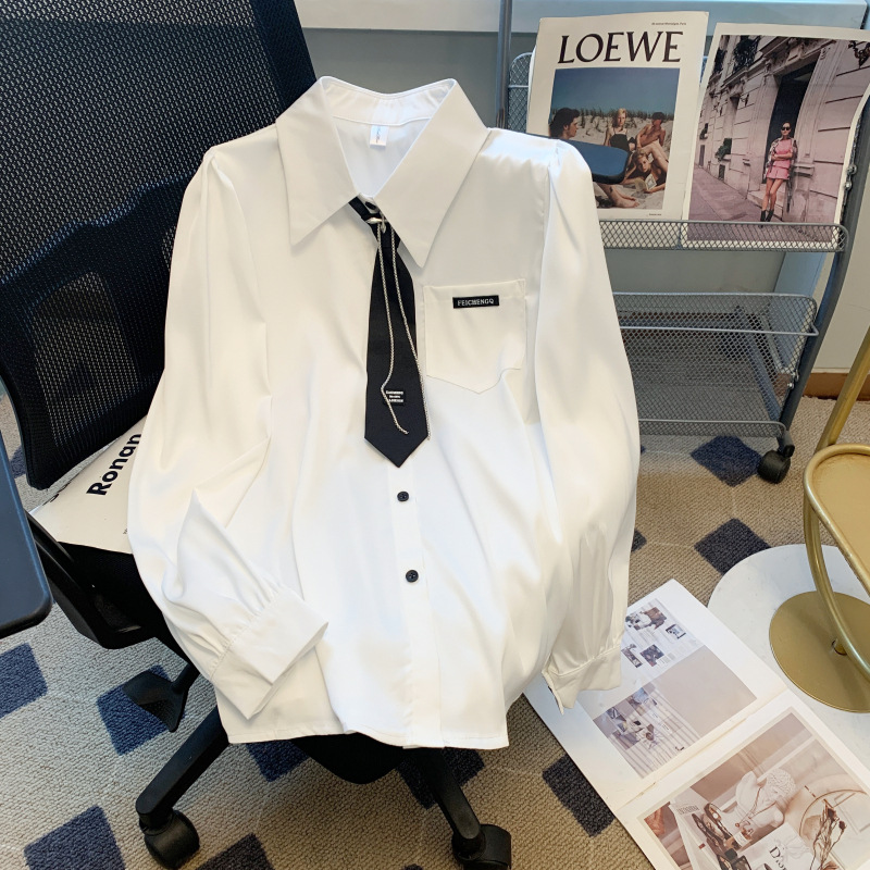 Real photos, in stock. Women's white long-sleeved loose-fitting collared shirt with a unique design and a tie. Satin top.