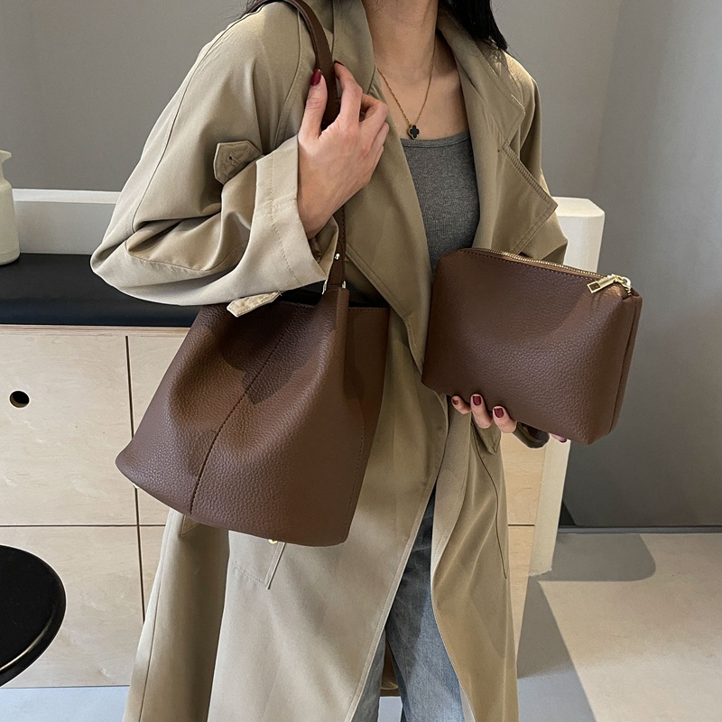 Commuter todo partido bolsa de color sólido para las mujeres 2024 nueva moda retro cubo bolsa nicho de alta calidad bolso de hombro ocasional