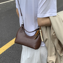 时尚小众饺子包包女2025秋冬新款潮百搭单肩斜挎包简约通勤腋下包