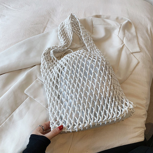 New solid color hand-woven bag, Korean ins hollow mesh bag, large capacity shoulder bag, fashionable and versatile armpit bag
