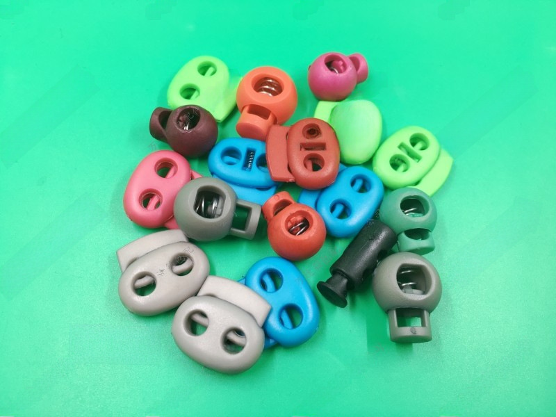 Single hole double hole black and white plastic spring buckle elastic buckle rope buckle pig nose buckle