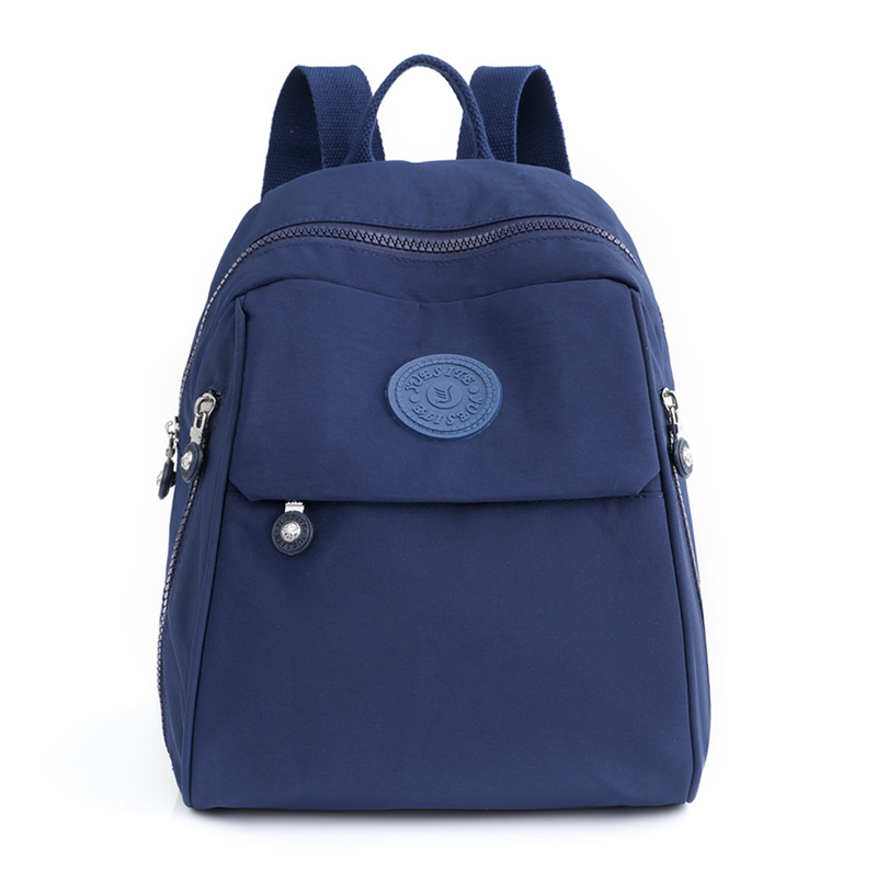 Mochila para mujer, mochila pequeña de tela Oxford de gran capacidad, resistente al agua, nueva mochila escolar de nailon lavanda de todo fósforo de moda