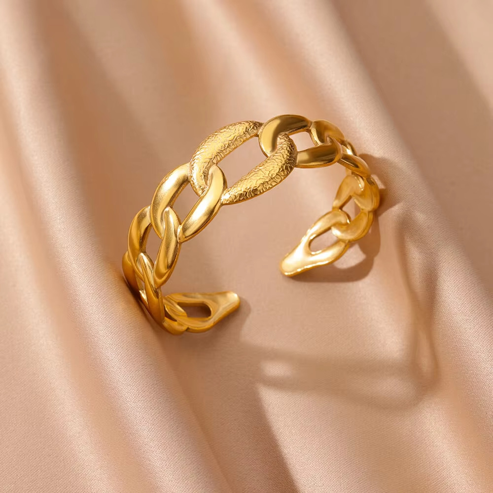 Venta directa de fábrica venta caliente de moda transfronteriza flor de acero inoxidable pulsera abierta flor hueca exagerada hoja joyería